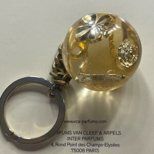 Authentic vintages Chanel  Gold  ball Keychain discoloration